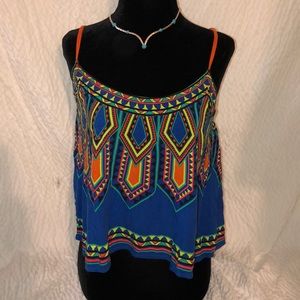 Trend setting slightly cropped tribal tank